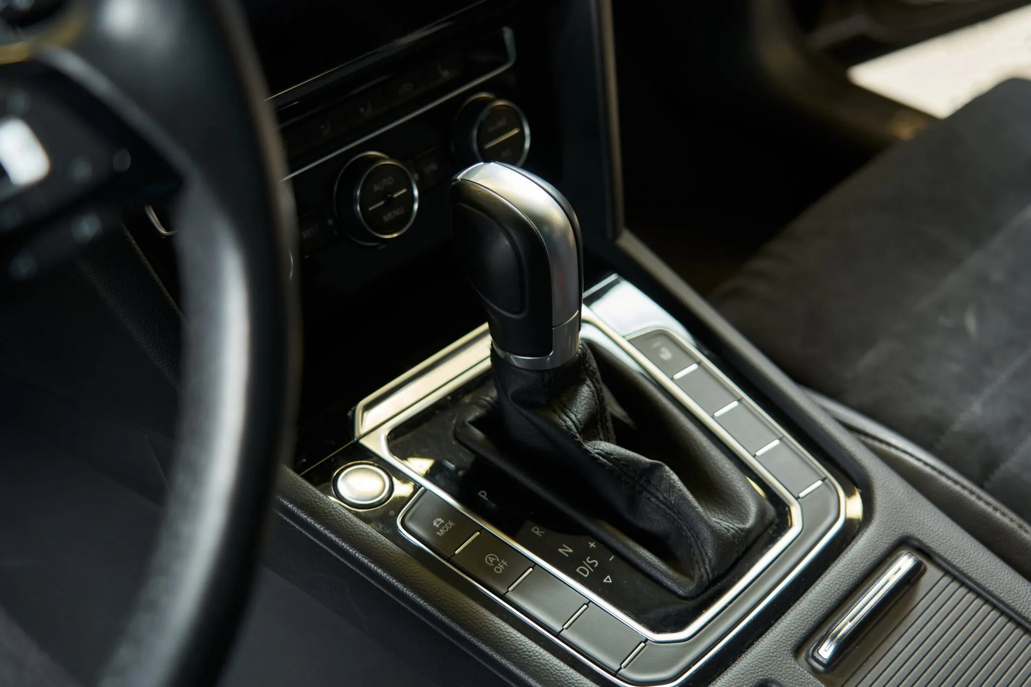 Automatic car gear shifter inside vehicle interior